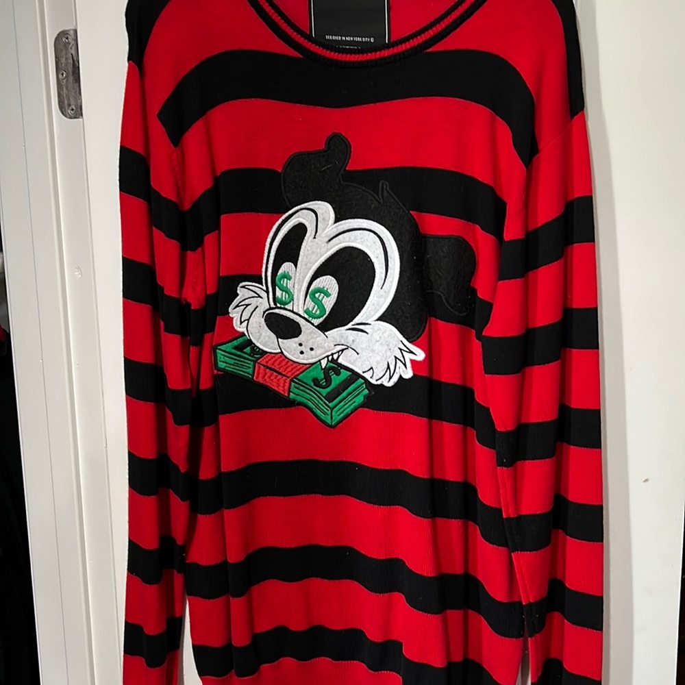 Red Reasons long sleeve shirt with black stripes and patch